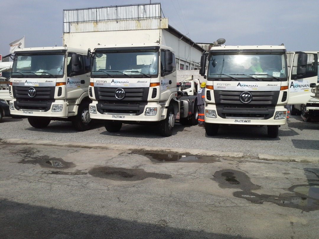 Flotte de camions devant le siège opérationnel ASDALFI à Yopougon